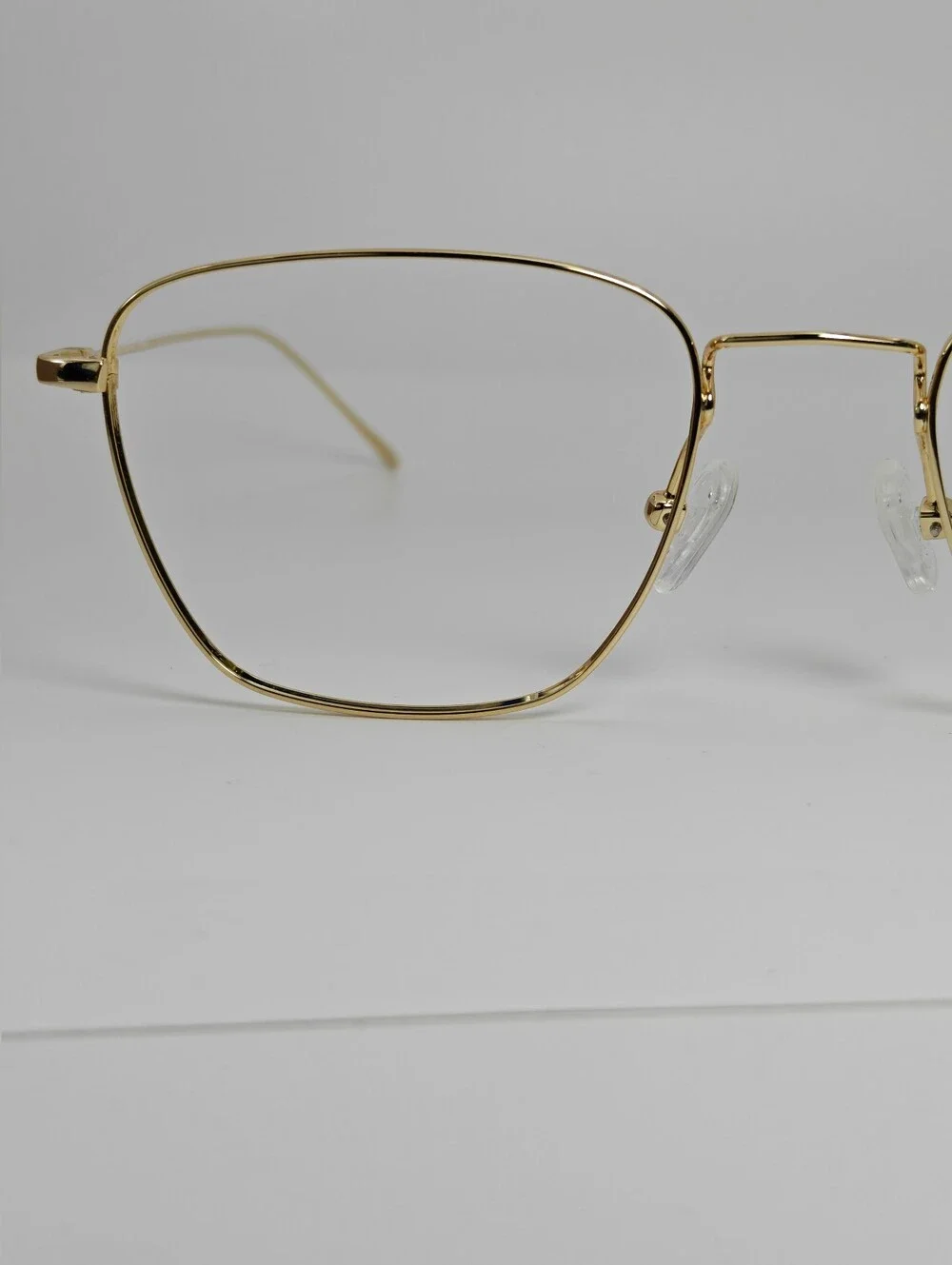 Future. Titanium Eyeglass Temple Arm in Gold. Minimalist Nose Pads.
